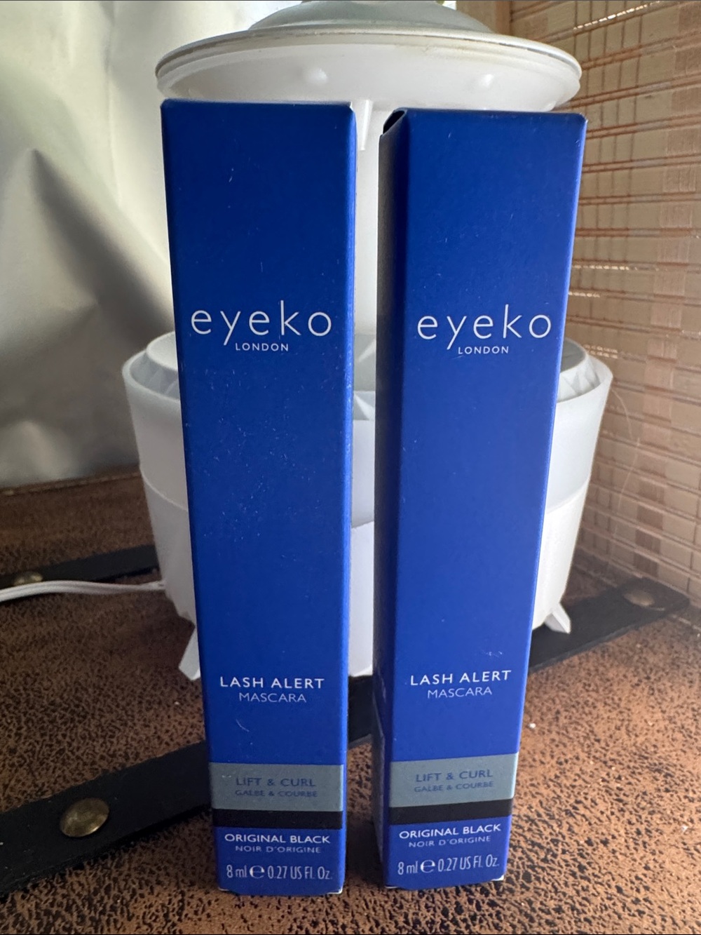 Eyeko Lash Alert Mascara Packaging in Deep Blue, original black, lifting curl.